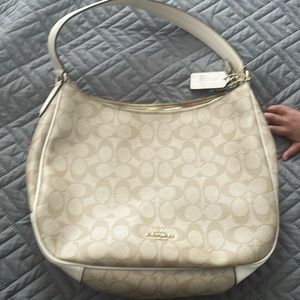 Off White and gold coach bag good condition.